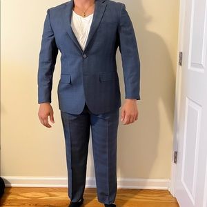 32x32 fitted suit. No longer fits him. Great condition only worn a few times.
